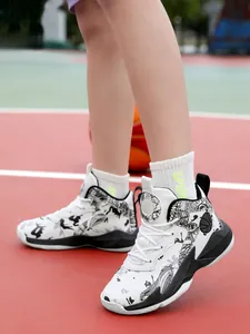 Detailed side view of professional kids basketball shoes with black white graffiti patterns