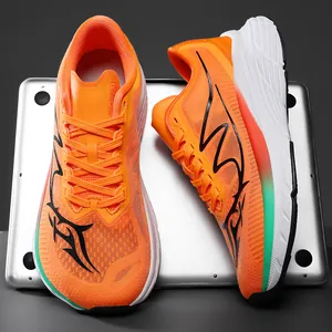 Macro detail of vibrant orange mesh running shoes with athletic graphic designs