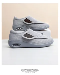 Bequeme graue Mesh-Schuhe für Senioren mit Luftpolstersohle und Klettverschluss.
