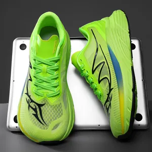 Macro detail of breathable lime green mesh running shoes featuring a wide toe box design.