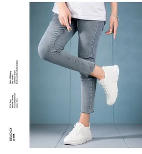 Side detail of white platform sneakers for women featuring breathable mesh and thick soles