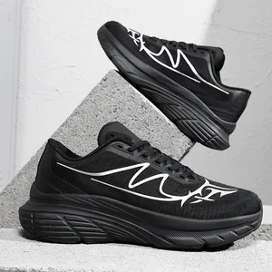 Detail view of black mesh wide-toe running shoes with cushioning for men's sports.