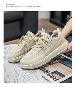 Detailed view of stylish cream breathable wide-toe sneakers on a fashion magazine