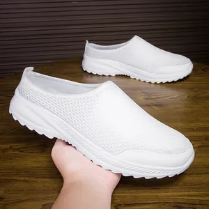 Close-up detail of white breathable mesh slip-on sneaker for men with flexible soft sole