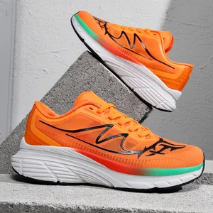 Close-up detail of orange mesh running shoes with wide-toe and cushioned white soles