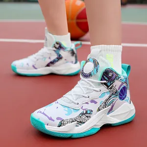 Professional high-top boys' basketball shoes with vibrant graffiti print on a red court