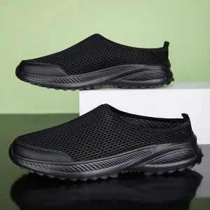 Detail view of black breathable mesh slip-on shoes with soft soles for men