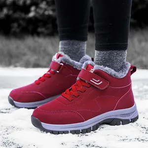 Dark red winter high-top walking boots with warm fleece lining and Velcro strap closure