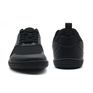 Comprehensive front and back view of black vintage casual German training sneakers