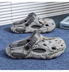 Detail view of men's EVA camouflage clogs with thick sole and leaf pattern