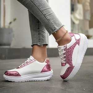 Trendy white sneakers for women with pink metallic accents and glitter details