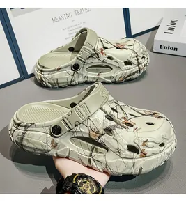 A detailed view showing men's camouflage graffiti EVA clogs with thick platform soles for travel.