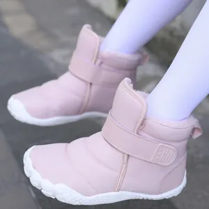 Pink insulated high-top children's snow boots with warm plush lining and adjustable Velcro strap