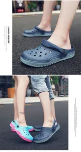 Close-up detail of non-slip thick sole clog sandals for couples on outdoor street