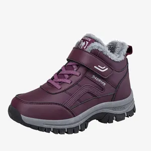Side view detail of a purple winter snow boot featuring warm grey faux fur lining