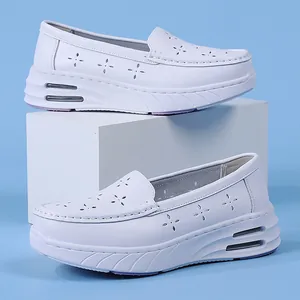 White air-cushioned nurse shoes with hollowed-out pattern and non-slip platform sole