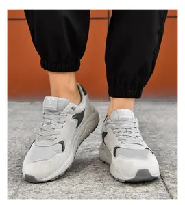 Close-up of grey lightweight casual men's sneakers with 8cm invisible height increase