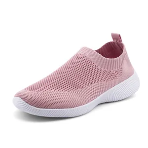 Comfortable pink flyknit slip-on sneakers for women with breathable mesh and soft sole