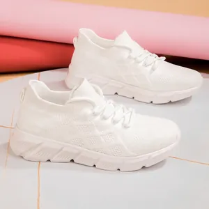 Breathable white flyknit sock sneakers for women featuring a lightweight athletic design