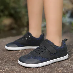 Kids wide toe box barefoot outdoor sneakers featuring black and blue speckled pattern