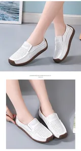 Detailed view of white perforated leather loafers with breathable hollow design