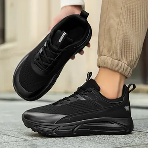 Black wide-toe barefoot athletic running shoes for men and women with wide feet outdoors