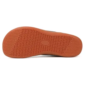 Detailed view of the durable non-slip gum rubber outsole for barefoot shoes
