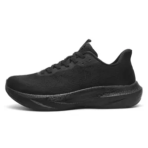 Detailed side view of breathable black flyknit running shoes with thick cushioned sole