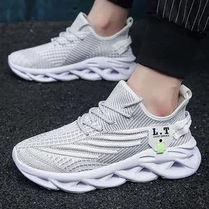 Men's breathable grey mesh sports sneakers featuring stylish chunky wavy sole design