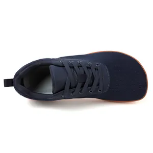 Top-down view of navy breathable fly-knit barefoot shoe with a wide toe box design.