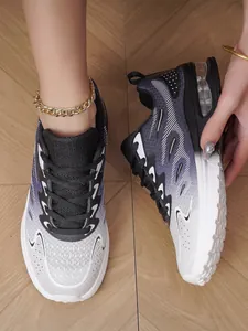 Close-up of breathable mesh running shoes for women with air cushion and gradient design