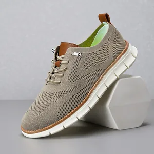 Close-up detail of lightweight breathable mesh men's loafers with thick white cushion sole