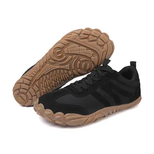 Black minimalist barefoot fitness shoes with textured rubber sole for yoga and running