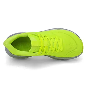 Top-down detailed view of neon green breathable flyknit running shoes with wide-toe design