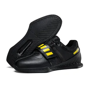Professional black weightlifting shoes for squat and deadlift training with yellow accents