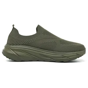 Side profile detail of breathable olive green fly-knit slip-on sports shoe for men