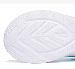 Close-up detail of white anti-slip textured outsole for lightweight women's sneakers
