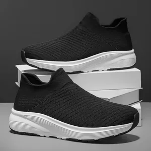 Breathable black fly-knit sports sock shoes with thick white soles for casual wear