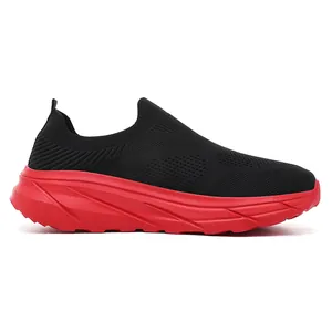 Side view of men's breathable black fly-knit slip-on sneakers with red sole