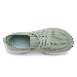 Top-down view of breathable wide-toe men's running shoes with sage green fly-knit mesh