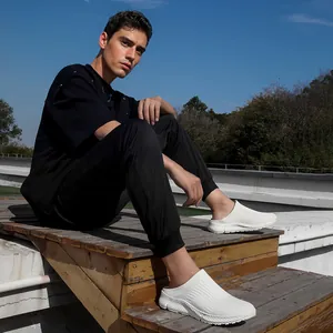 Lightweight men's breathable fly-knit slip-on sneakers in white for summer sports