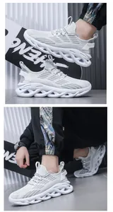 Close-up of white shock-absorbing running shoes with unique wavy hollowed-out soles.