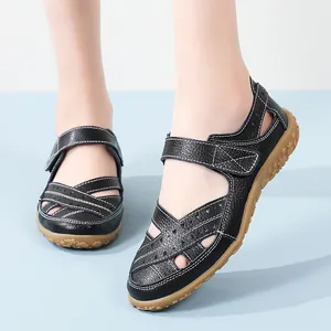 Comfortable black hollow-out leather sandals for women with non-slip durable gum soles