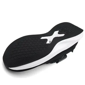 Detailed view of the durable rubber outsole of a wide-last men's running shoe with grip