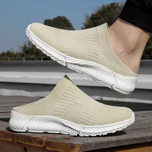 Side view of beige breathable fly-knit slip-on shoes with a thick textured white sole.