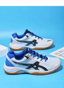 Professional badminton shoes with blue and silver accents and durable carbon plate sole