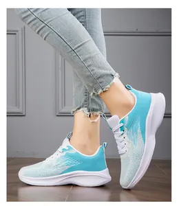 Side view of lightweight blue and white gradient breathable mesh running sneakers for women