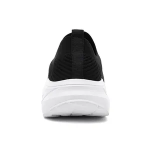 Detailed heel view of men's breathable black knit slip-on sneakers with a white sole