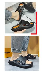 Detail views of black and orange slides shown on feet and from various angles
