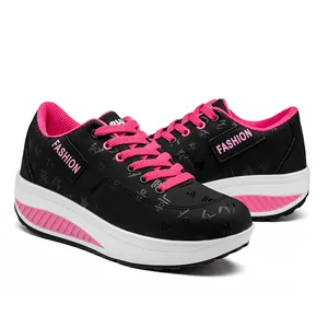 Zapatos balancín profesionales para mujer en negro y rosa con suela gruesa y deportiva